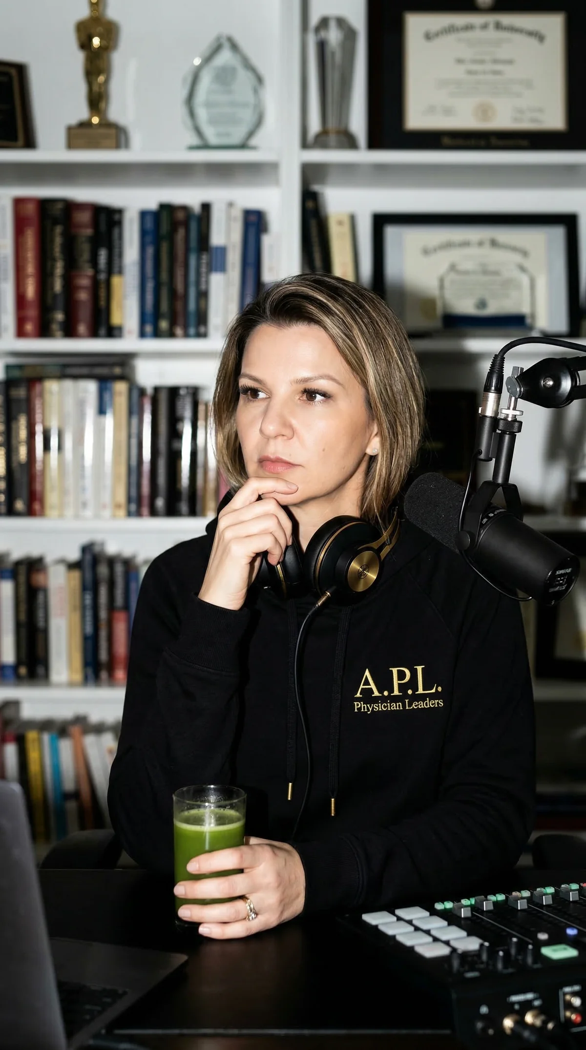 Dr. Vuslat Muslu Erdem in a thoughtful consultation